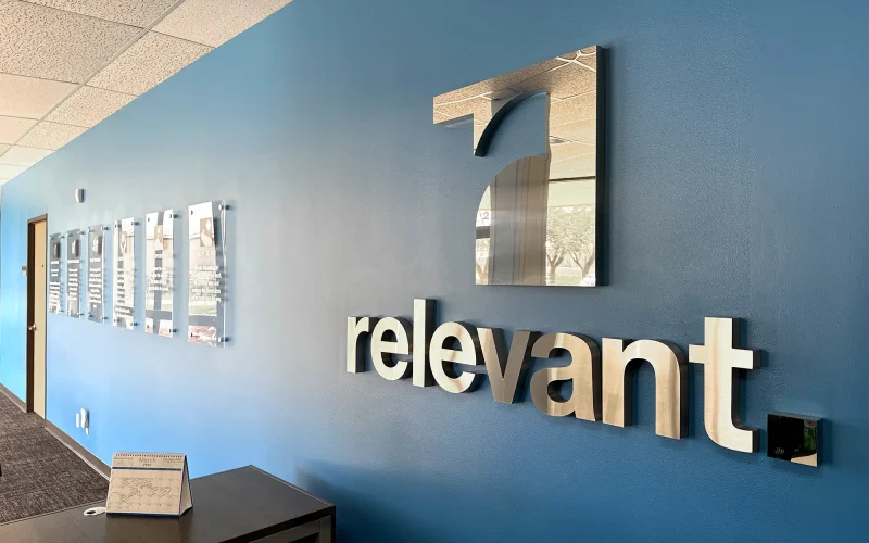 Relevant Solutions wall logo, symbolizing the company’s commitment to delivering reliable industrial solutions across automation, instrumentation, valves, and rotating equipment sectors.